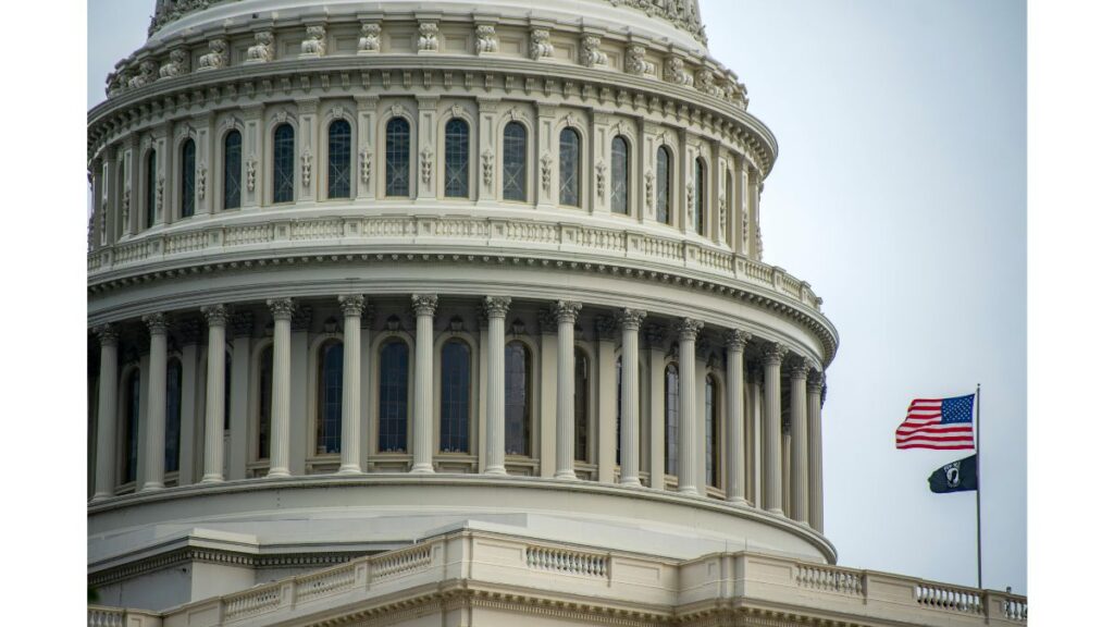 United States Capitol building with an American flag in front